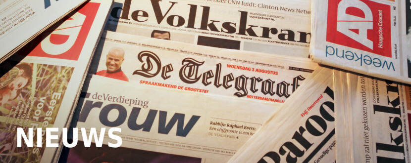 Foto van stapel kranten met het woord Nieuws